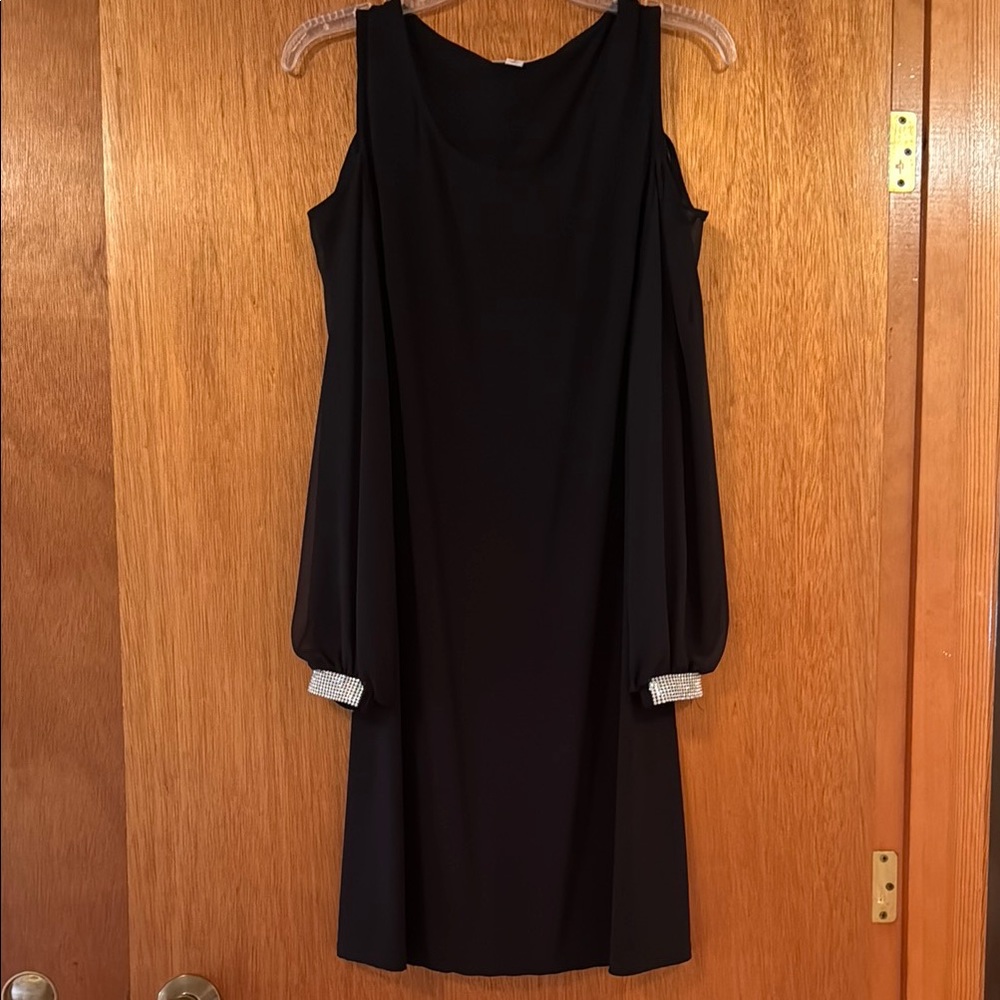 Elegant Black Dress with Embellished Sleeves